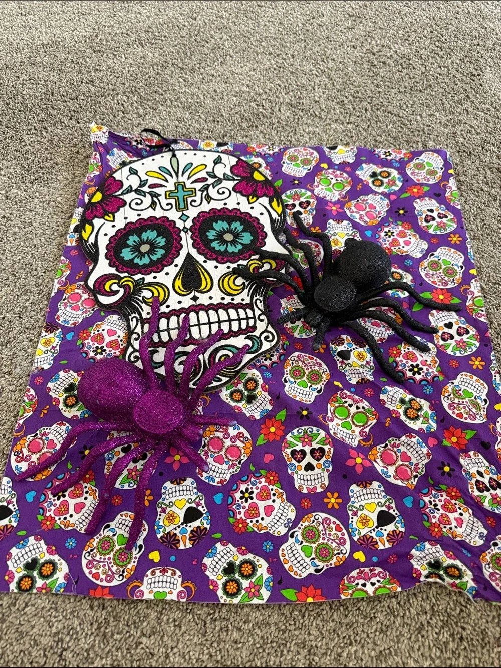 Day of the Dead Decorative Skull Wall Hanging with Purple and Black Accents
